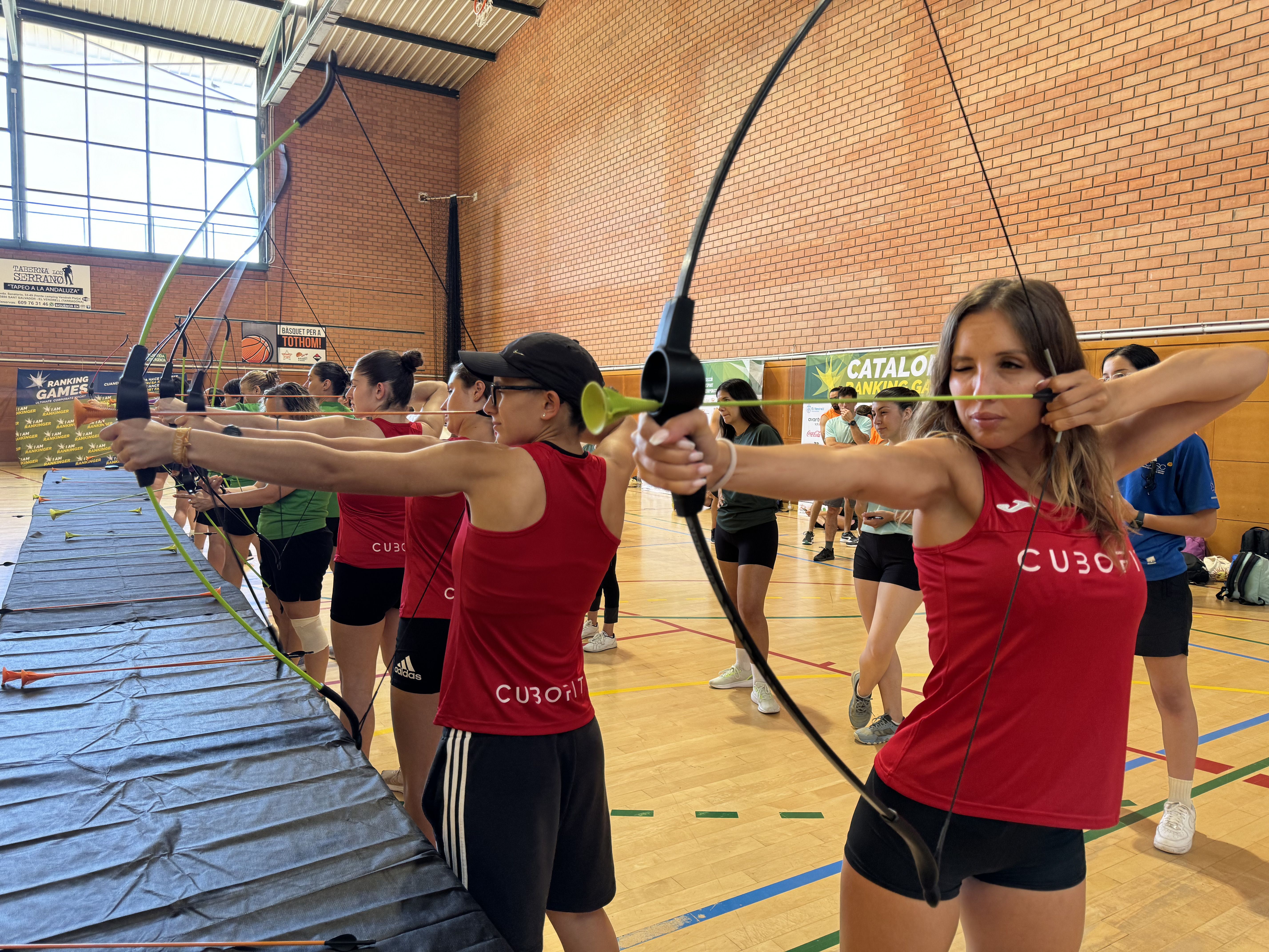 Miembros de la plantilla de Cubofit participan en un evento de ranking games 